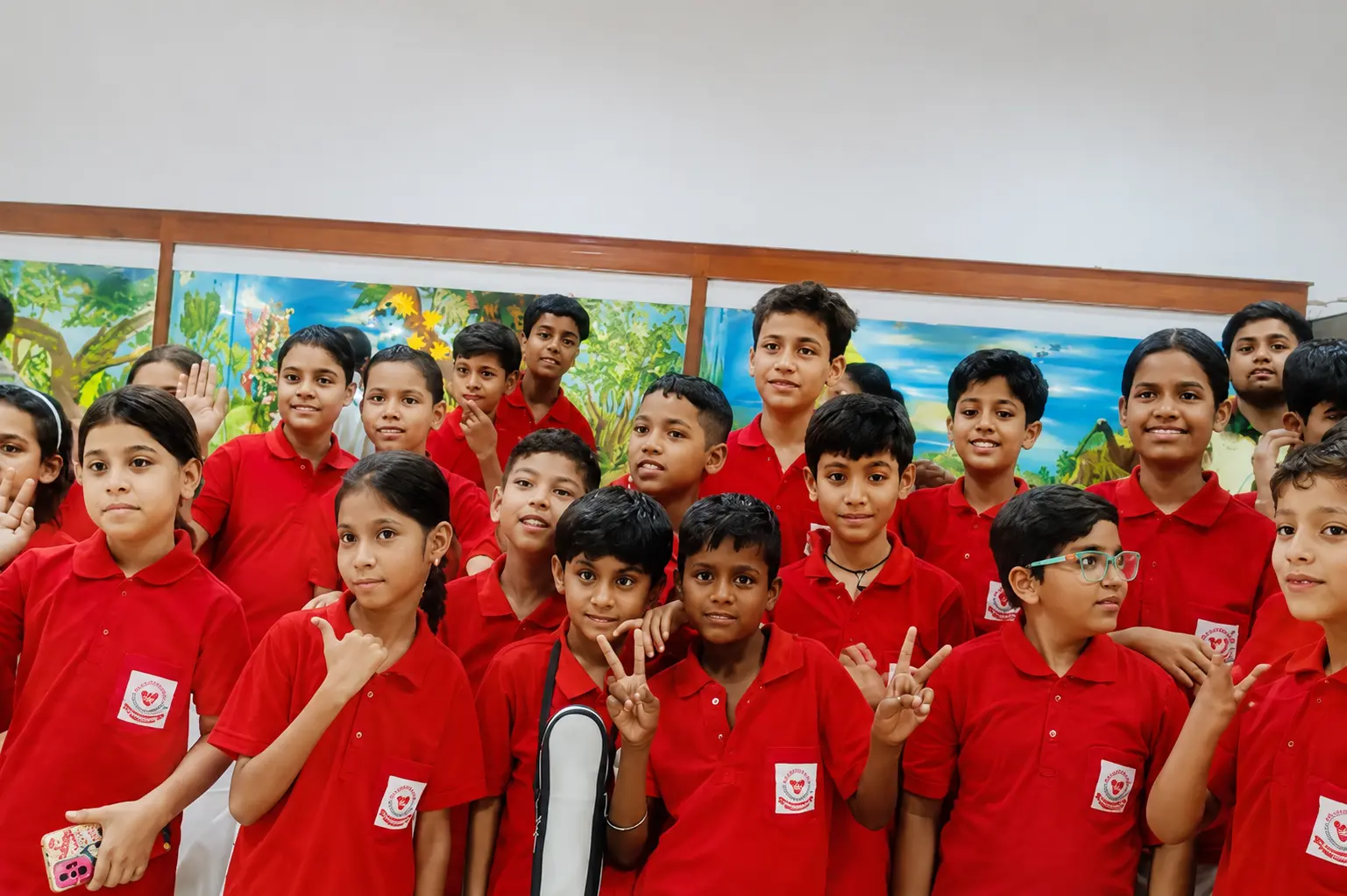 Cheerful school group portrait indoors